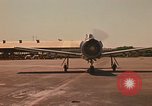Image of Laotian trainer aircraft T-28D Udorn Royal Thai Air Force Base Thailand, 1972, second 3 stock footage video 65675038807