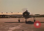Image of Laotian trainer aircraft T-28D Udorn Royal Thai Air Force Base Thailand, 1972, second 5 stock footage video 65675038807