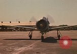 Image of Laotian trainer aircraft T-28D Udorn Royal Thai Air Force Base Thailand, 1972, second 6 stock footage video 65675038807