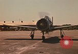 Image of Laotian trainer aircraft T-28D Udorn Royal Thai Air Force Base Thailand, 1972, second 7 stock footage video 65675038807