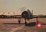 Image of Laotian trainer aircraft T-28D Udorn Royal Thai Air Force Base Thailand, 1972, second 8 stock footage video 65675038807