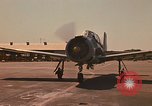 Image of Laotian trainer aircraft T-28D Udorn Royal Thai Air Force Base Thailand, 1972, second 9 stock footage video 65675038807
