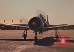 Image of Laotian trainer aircraft T-28D Udorn Royal Thai Air Force Base Thailand, 1972, second 11 stock footage video 65675038807