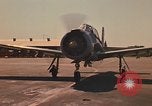 Image of Laotian trainer aircraft T-28D Udorn Royal Thai Air Force Base Thailand, 1972, second 12 stock footage video 65675038807
