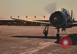 Image of Laotian trainer aircraft T-28D Udorn Royal Thai Air Force Base Thailand, 1972, second 13 stock footage video 65675038807