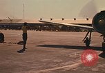 Image of Laotian trainer aircraft T-28D Udorn Royal Thai Air Force Base Thailand, 1972, second 14 stock footage video 65675038807
