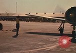 Image of Laotian trainer aircraft T-28D Udorn Royal Thai Air Force Base Thailand, 1972, second 15 stock footage video 65675038807
