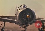 Image of Laotian trainer aircraft T-28D Udorn Royal Thai Air Force Base Thailand, 1972, second 16 stock footage video 65675038807