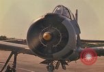 Image of Laotian trainer aircraft T-28D Udorn Royal Thai Air Force Base Thailand, 1972, second 18 stock footage video 65675038807