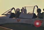 Image of Laotian trainer aircraft T-28D Udorn Royal Thai Air Force Base Thailand, 1972, second 24 stock footage video 65675038807