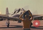 Image of Laotian trainer aircraft T-28D Udorn Royal Thai Air Force Base Thailand, 1972, second 33 stock footage video 65675038807