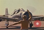 Image of Laotian trainer aircraft T-28D Udorn Royal Thai Air Force Base Thailand, 1972, second 34 stock footage video 65675038807