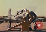 Image of Laotian trainer aircraft T-28D Udorn Royal Thai Air Force Base Thailand, 1972, second 35 stock footage video 65675038807