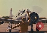 Image of Laotian trainer aircraft T-28D Udorn Royal Thai Air Force Base Thailand, 1972, second 36 stock footage video 65675038807