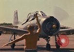 Image of Laotian trainer aircraft T-28D Udorn Royal Thai Air Force Base Thailand, 1972, second 37 stock footage video 65675038807