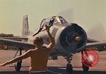 Image of Laotian trainer aircraft T-28D Udorn Royal Thai Air Force Base Thailand, 1972, second 38 stock footage video 65675038807