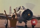 Image of Laotian trainer aircraft T-28D Udorn Royal Thai Air Force Base Thailand, 1972, second 39 stock footage video 65675038807