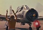Image of Laotian trainer aircraft T-28D Udorn Royal Thai Air Force Base Thailand, 1972, second 41 stock footage video 65675038807