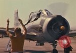 Image of Laotian trainer aircraft T-28D Udorn Royal Thai Air Force Base Thailand, 1972, second 42 stock footage video 65675038807
