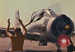 Image of Laotian trainer aircraft T-28D Udorn Royal Thai Air Force Base Thailand, 1972, second 43 stock footage video 65675038807