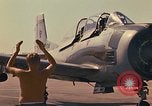 Image of Laotian trainer aircraft T-28D Udorn Royal Thai Air Force Base Thailand, 1972, second 45 stock footage video 65675038807
