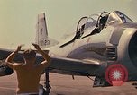 Image of Laotian trainer aircraft T-28D Udorn Royal Thai Air Force Base Thailand, 1972, second 46 stock footage video 65675038807