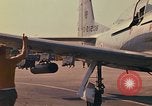 Image of Laotian trainer aircraft T-28D Udorn Royal Thai Air Force Base Thailand, 1972, second 49 stock footage video 65675038807