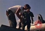 Image of Laotian trainer aircraft T-28D Udorn Royal Thai Air Force Base Thailand, 1972, second 51 stock footage video 65675038807