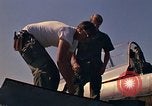 Image of Laotian trainer aircraft T-28D Udorn Royal Thai Air Force Base Thailand, 1972, second 52 stock footage video 65675038807