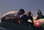 Image of Laotian trainer aircraft T-28D Udorn Royal Thai Air Force Base Thailand, 1972, second 53 stock footage video 65675038807