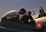 Image of Laotian trainer aircraft T-28D Udorn Royal Thai Air Force Base Thailand, 1972, second 56 stock footage video 65675038807