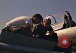 Image of Laotian trainer aircraft T-28D Udorn Royal Thai Air Force Base Thailand, 1972, second 58 stock footage video 65675038807
