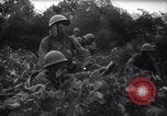 Standbild Japanische Infanterie Waten im seichten Flüssen Hunan China, 1941, aus Sekunde 59 historischem Filmmaterial Videoclip 65675038832