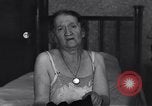 Image of old Jewish couple evicted Germany, 1936, second 50 stock footage video 65675038851