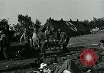 Standbild verletzte Soldaten St. Mere Eglise Frankreich, 1944, aus Sekunde 40 historischem Filmmaterial Videoclip 65675038875