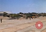 Image of RF-4C Phantom II aircraft returns to Ubon RTAFB after mission Ubon Ratchathani Thailand, 1967, second 48 stock footage video 65675038908