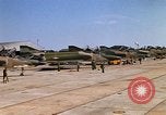 Image of RF-4C Phantom II aircraft returns to Ubon RTAFB after mission Ubon Ratchathani Thailand, 1967, second 52 stock footage video 65675038908