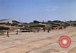 Image of RF-4C Phantom II aircraft returns to Ubon RTAFB after mission Ubon Ratchathani Thailand, 1967, second 53 stock footage video 65675038908