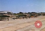 Image of RF-4C Phantom II aircraft returns to Ubon RTAFB after mission Ubon Ratchathani Thailand, 1967, second 55 stock footage video 65675038908