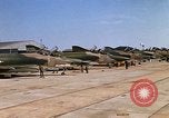 Image of RF-4C Phantom II aircraft returns to Ubon RTAFB after mission Ubon Ratchathani Thailand, 1967, second 58 stock footage video 65675038908