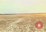 Image of USAF F-4C aircraft landing with drogue chute Ubon Ratchathani Thailand, 1967, second 1 stock footage video 65675038909