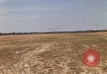 Image of USAF F-4C aircraft landing with drogue chute Ubon Ratchathani Thailand, 1967, second 3 stock footage video 65675038909