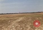 Image of USAF F-4C aircraft landing with drogue chute Ubon Ratchathani Thailand, 1967, second 6 stock footage video 65675038909