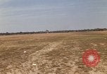 Image of USAF F-4C aircraft landing with drogue chute Ubon Ratchathani Thailand, 1967, second 7 stock footage video 65675038909