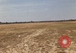 Image of USAF F-4C aircraft landing with drogue chute Ubon Ratchathani Thailand, 1967, second 8 stock footage video 65675038909