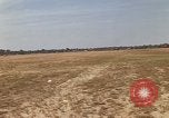 Image of USAF F-4C aircraft landing with drogue chute Ubon Ratchathani Thailand, 1967, second 9 stock footage video 65675038909