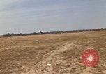 Image of USAF F-4C aircraft landing with drogue chute Ubon Ratchathani Thailand, 1967, second 10 stock footage video 65675038909