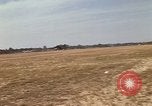 Image of USAF F-4C aircraft landing with drogue chute Ubon Ratchathani Thailand, 1967, second 12 stock footage video 65675038909
