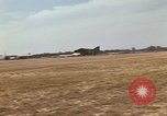 Image of USAF F-4C aircraft landing with drogue chute Ubon Ratchathani Thailand, 1967, second 13 stock footage video 65675038909