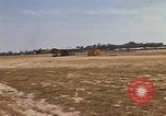 Image of USAF F-4C aircraft landing with drogue chute Ubon Ratchathani Thailand, 1967, second 18 stock footage video 65675038909